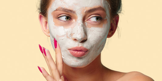 Woman with a clay mask on. How to fight and prevent acne, breakouts and blemishes